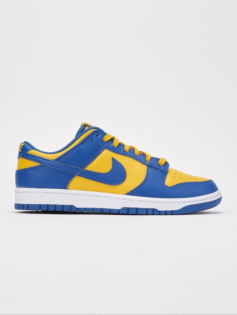 Nike
Dunk Low 'UCLA Blue and Yellow Athletic Sneakers